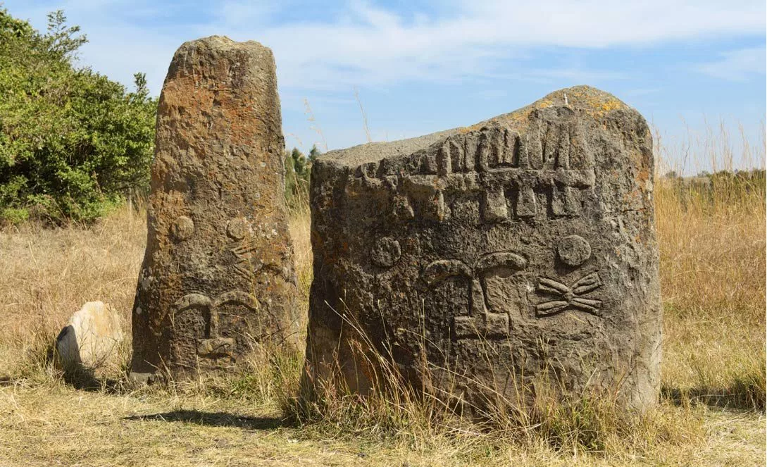 The intricately curved stones of Xayyaa (Tiya) are the marks of the Oromo Gadaa governance of 1249BC – 889BC Xayyaa era.png