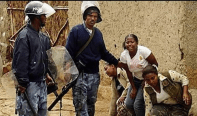 Agazi security forces beating Oromo women, children)