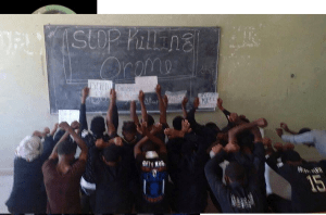 Courageous High School Oromo Students in continue silent protest and resistance inside the room after prevented by soldiers from marching outside. #OromoProtest in Adama at high school, 28 December 2015