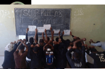 Courageous High School Oromo Students in continue silent protest and resistance inside the room after prevented by soldiers from marching outside. #OromoProtest in Adama at high school, 28 December 2015
