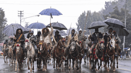 Oromo men, wearing their traditional costume.png