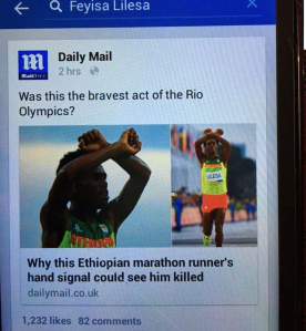 Oromo Olympic marathon athlete Fayyisaa Lalisaa in the social and international media. #OrompProtests global icon. p3