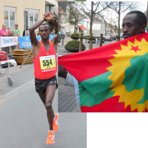 Athlete Fraol Ebissa Won the Germany 10Km race and shows his solidarity with #OromoProtests. 4 September 2016. p2